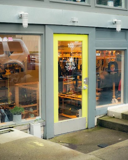 Windthrow storefront with a yellow door